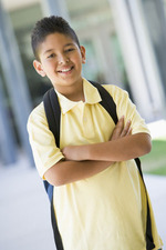 A student crossing his arms